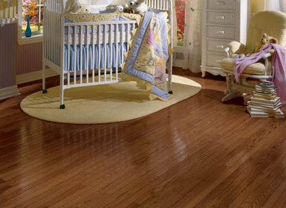 Manchester Red Oak Solid in Saddle 2-1/4" | Bruce